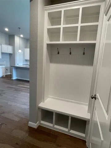 a view of an empty walk in closet