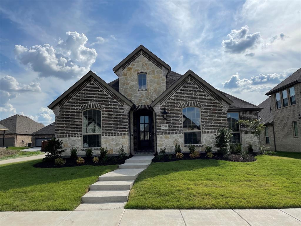 13969 Falcon Ranch Drive Frisco, TX 75035 - Photo 25 of 25 a front view of a house with a yard