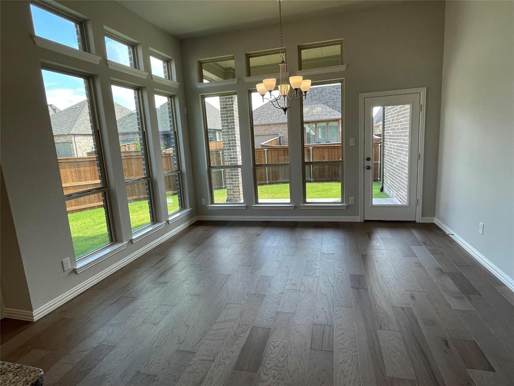 13969 Falcon Ranch Drive Frisco, TX 75035 - Photo 7 of 25 a view of room with window and hardwood floor