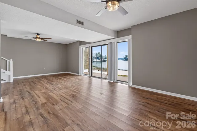 a view of a swimming pool with seating area