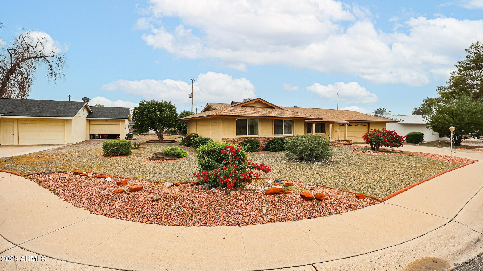 11851 North Thunderbird Road Sun City, AZ 85351 - Photo 5 of 46 a view of a house with entertaining space