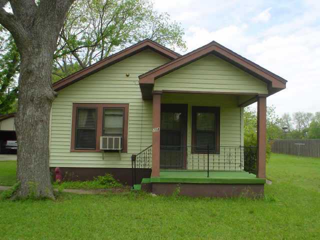 758 Springdale Road Austin, TX 78702 - Photo 1 of 1 a front view of a house with a yard