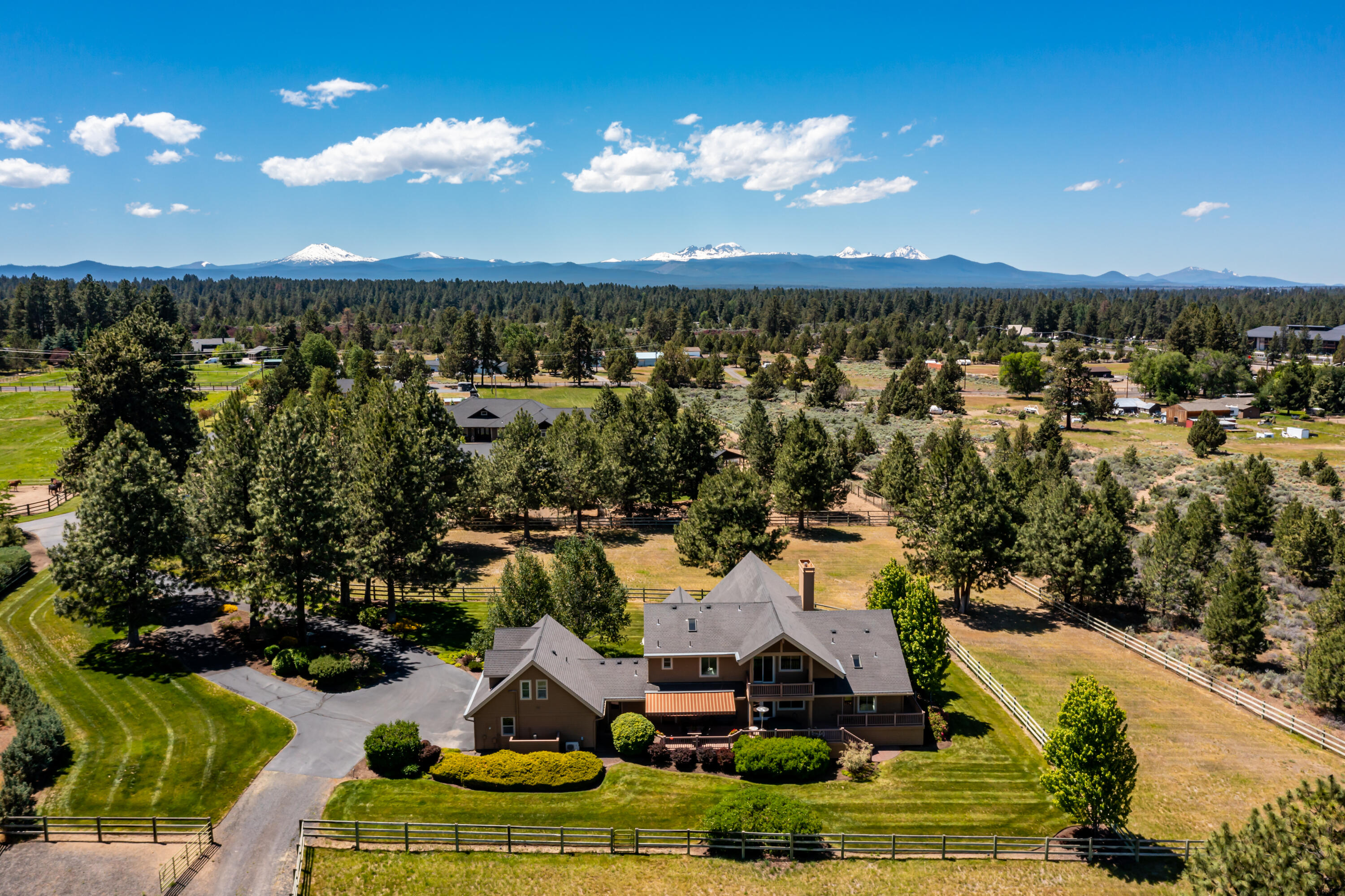 60696 Tekampe Road Bend, OR 97702 - Photo 3 of 61 an aerial view of residential houses with outdoor space and swimming pool