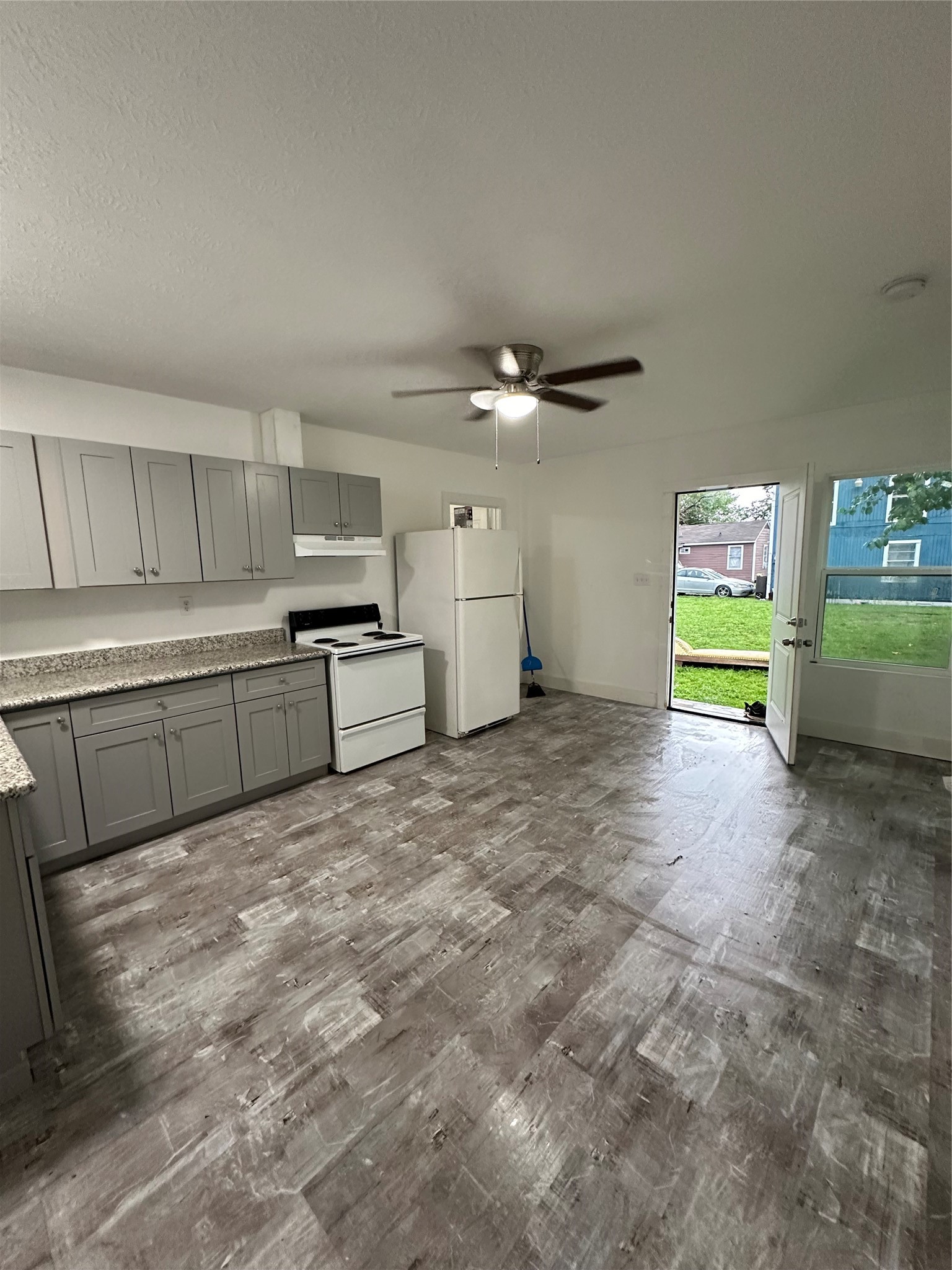 1405 Miles Street Houston, TX 77015 - Photo 2 of 9 a kitchen with a sink and cabinets