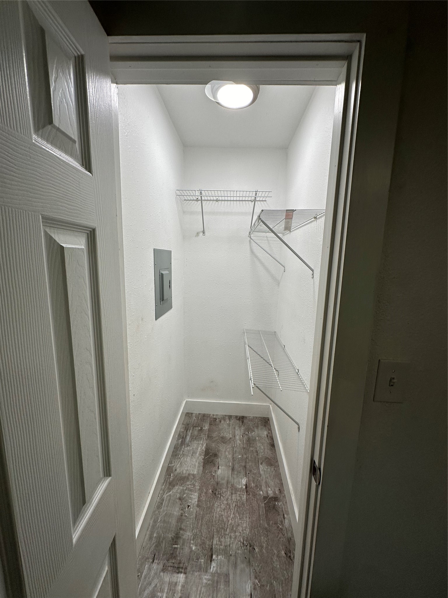 1405 Miles Street Houston, TX 77015 - Photo 6 of 9 a view of a hallway with wooden floor