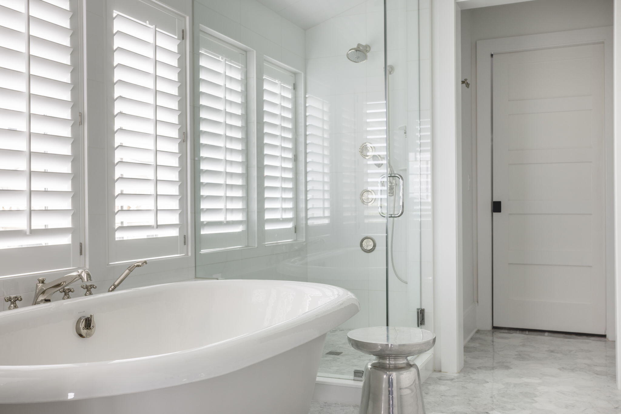 28 Bluff Lane Santa Rosa Beach, FL 32459 - Photo 20 of 24 a white bath tub sitting in a bathroom next to a window