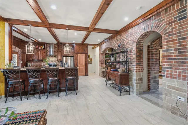 a room with lots of chairs and a table