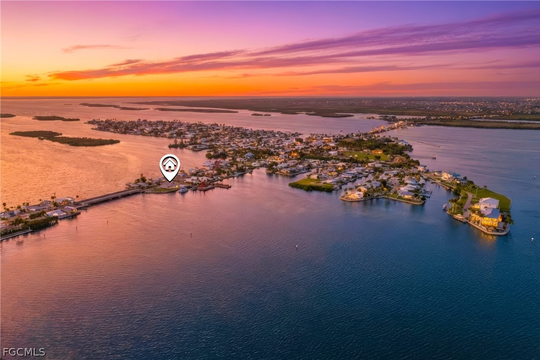 4767 Pine Island Road Cape Coral, FL 33993 - Photo 1 of 12 view of an ocean and beach