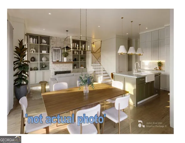 a kitchen with stainless steel appliances kitchen island granite countertop a table and chairs in it