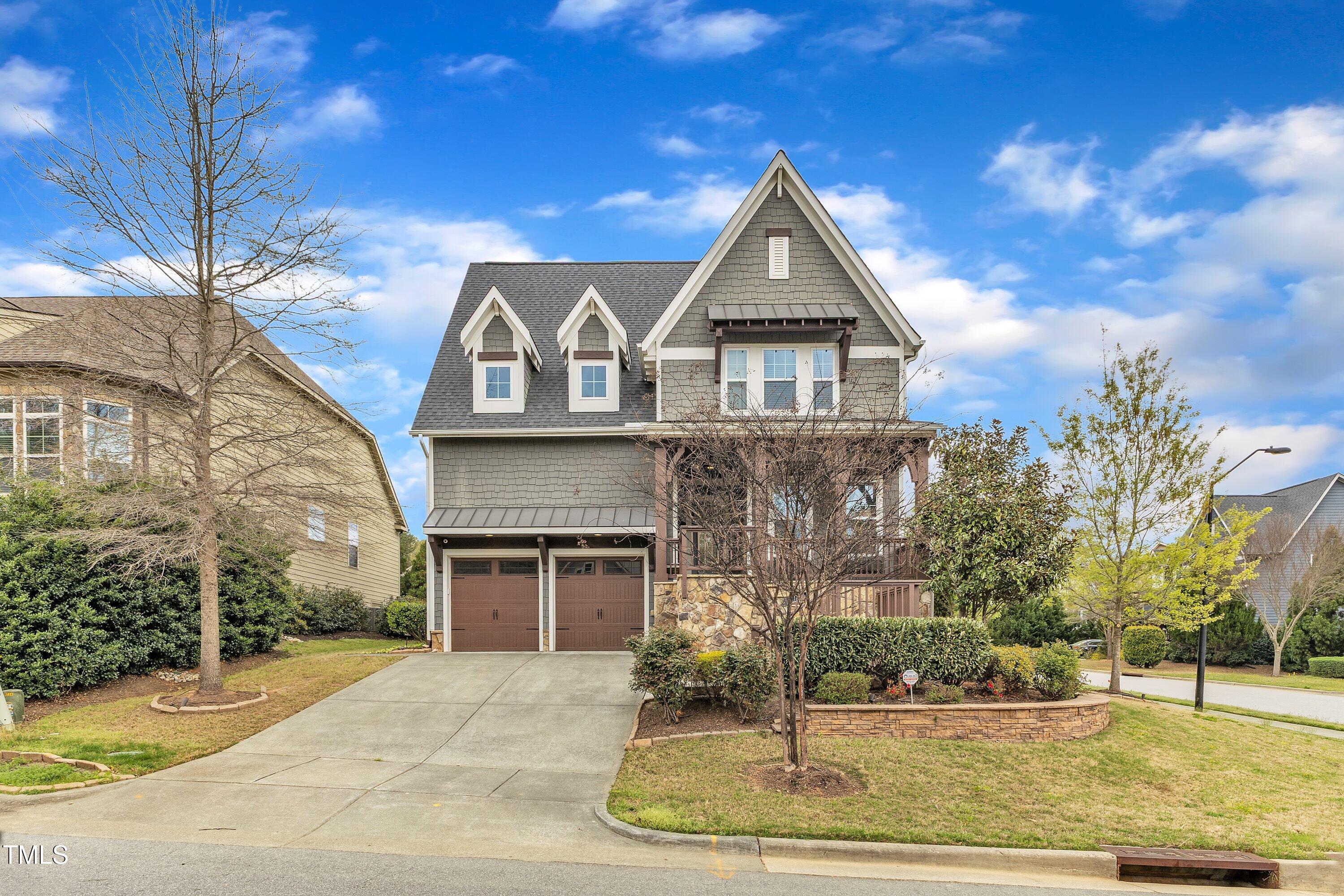 8121 Greys Landing Way Raleigh, NC 27615 - Photo 81 of 95 a front view of a house with a yard