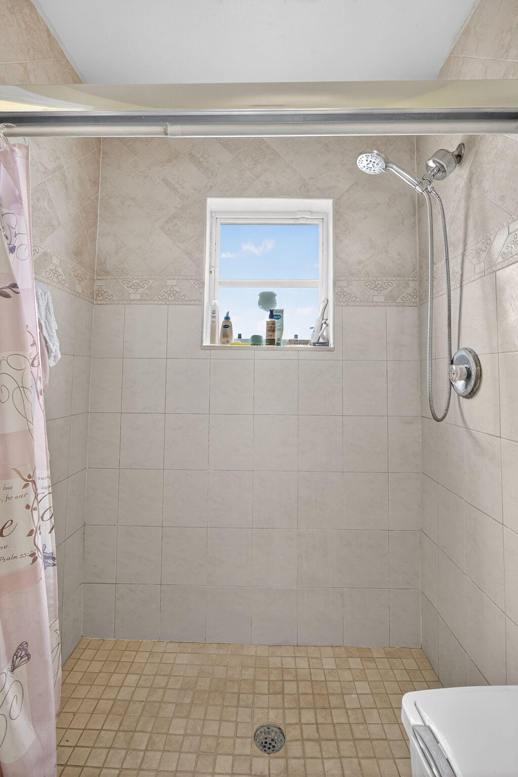 6877 3rd Street Jupiter, FL 33458 - Photo 11 of 25 a bathroom with a shower
