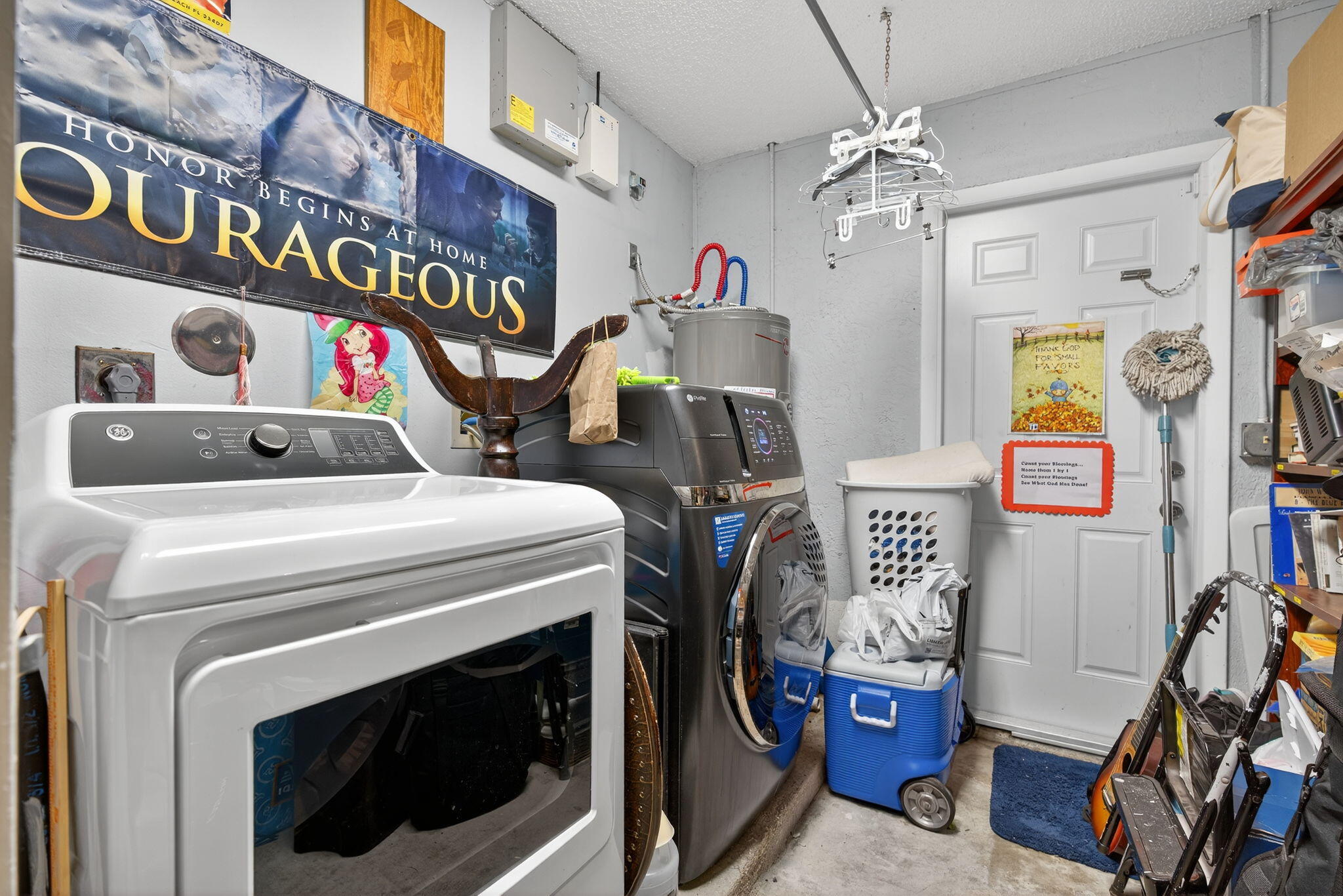 6877 3rd Street Jupiter, FL 33458 - Photo 17 of 25 a utility room with dryer and washer