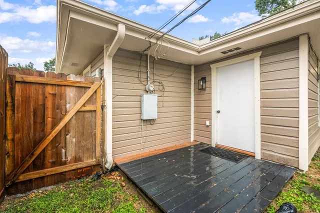 a view of house with wooden floor and stairs