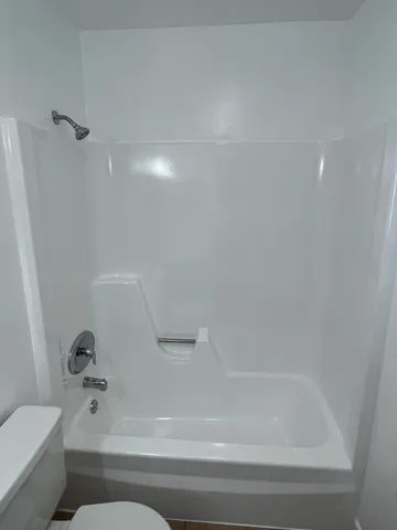 a bathroom with a bathtub