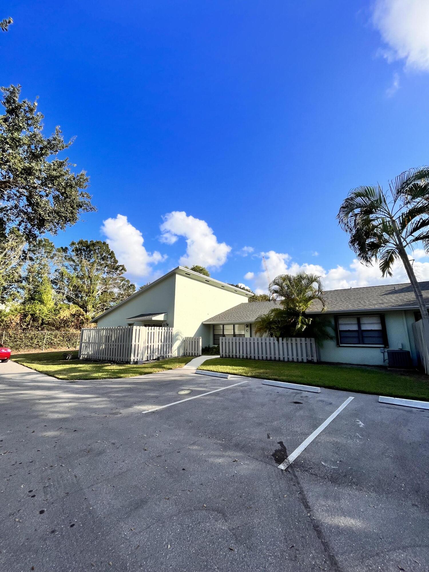 431 Jupiter Lakes Boulevard, Unit 2104C Jupiter, FL 33458 - Photo 18 of 28 a view of an outdoor space and yard