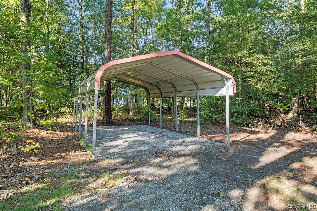 10121 Highview Road Glen Allen, VA 23059 - Photo 24 of 24 View of yard with a carport