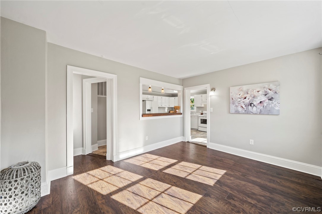 10121 Highview Road Glen Allen, VA 23059 - Photo 5 of 24 Empty room featuring dark hardwood flooring