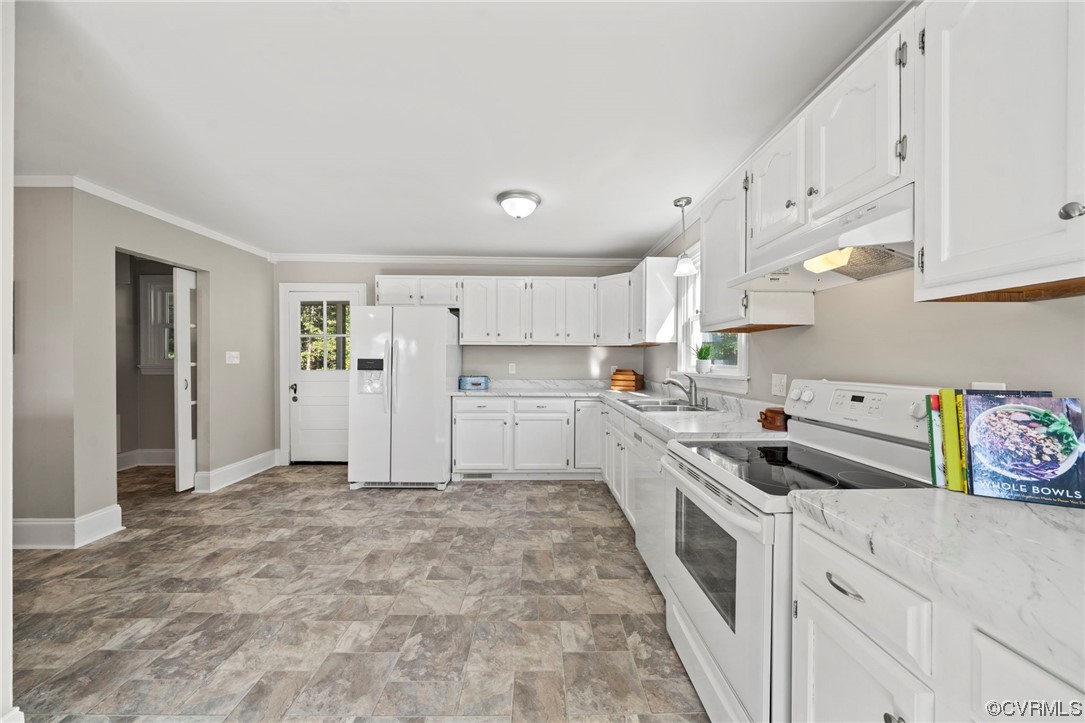10121 Highview Road Glen Allen, VA 23059 - Photo 8 of 24 Kitchen featuring sink, white cabinetry, white app