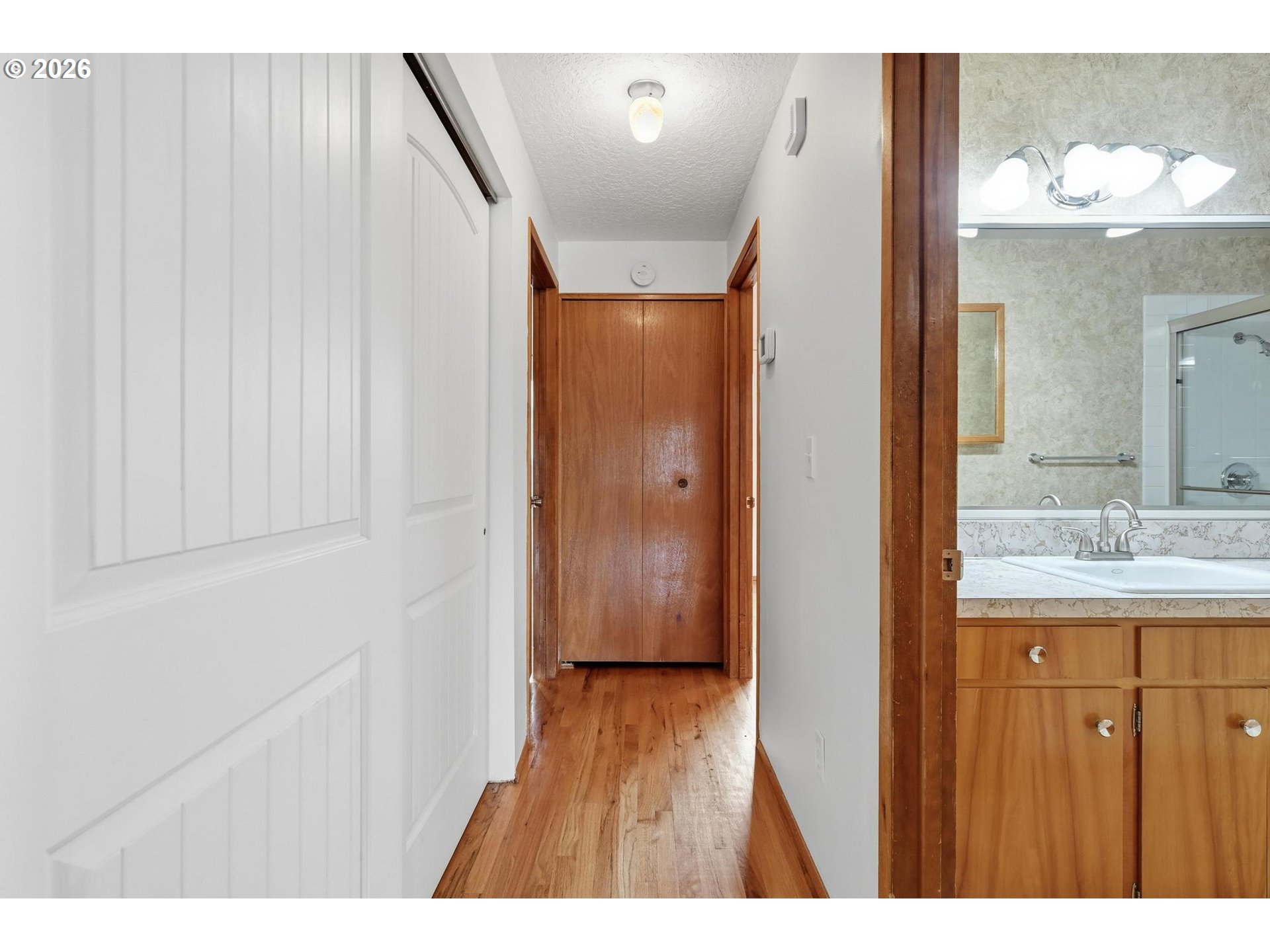 1720 Jansen Way Woodburn, OR 97071 - Photo 20 of 42 a bathroom with a sink and a mirror