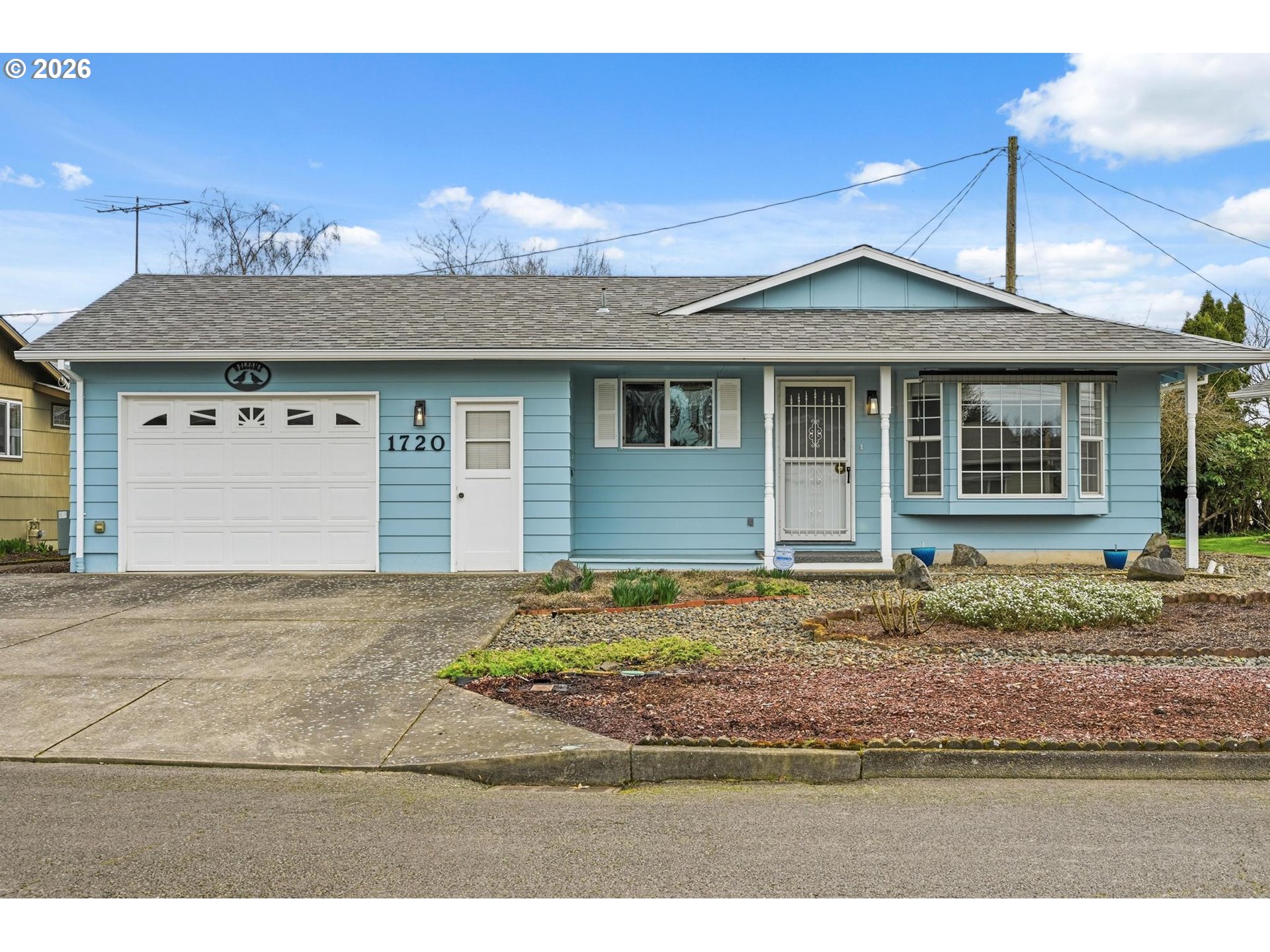 1720 Jansen Way Woodburn, OR 97071 - Photo 2 of 42 a house view with a outdoor space