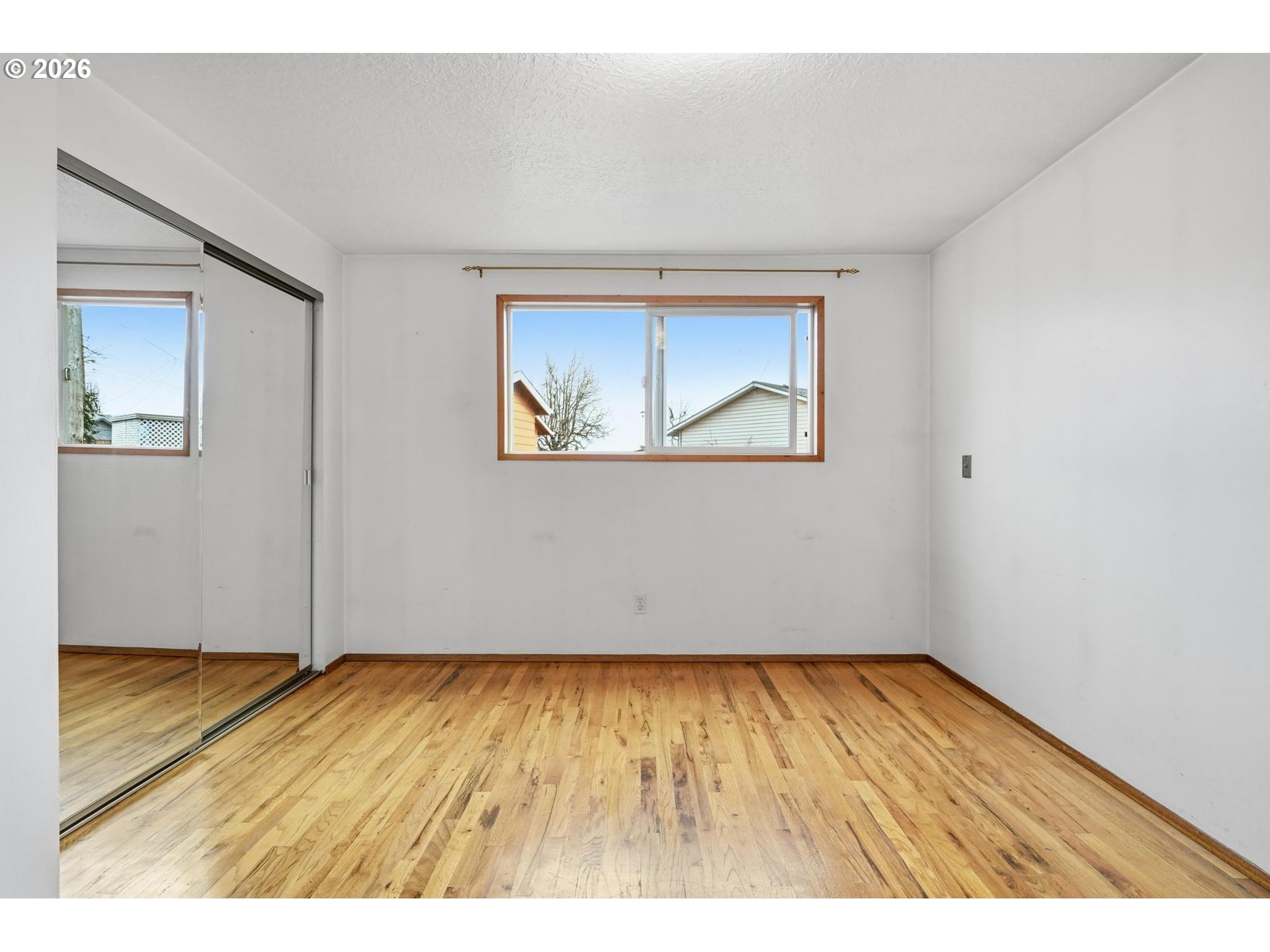 1720 Jansen Way Woodburn, OR 97071 - Photo 25 of 42 wooden floor in an empty room