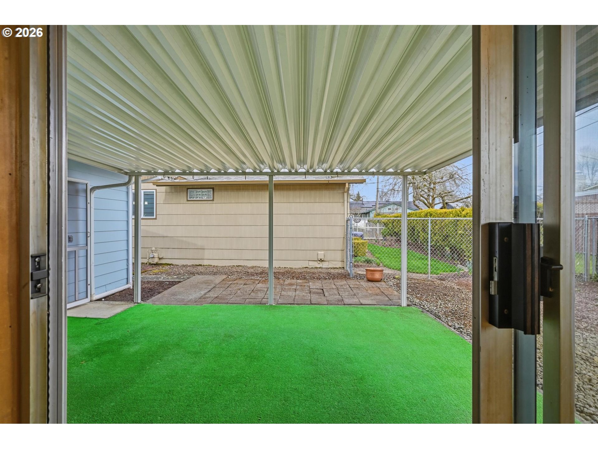 1720 Jansen Way Woodburn, OR 97071 - Photo 29 of 42 a backyard of a house with lots of green space