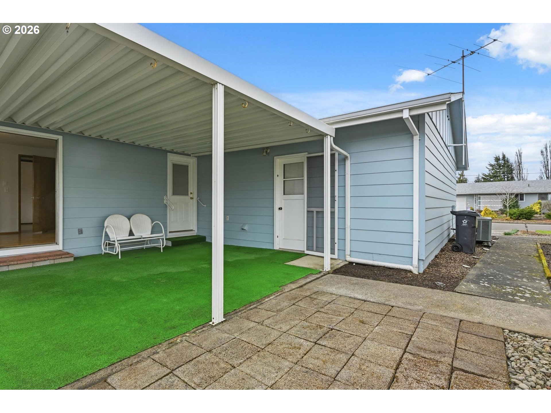 1720 Jansen Way Woodburn, OR 97071 - Photo 31 of 42 a backyard of a house with table and chairs