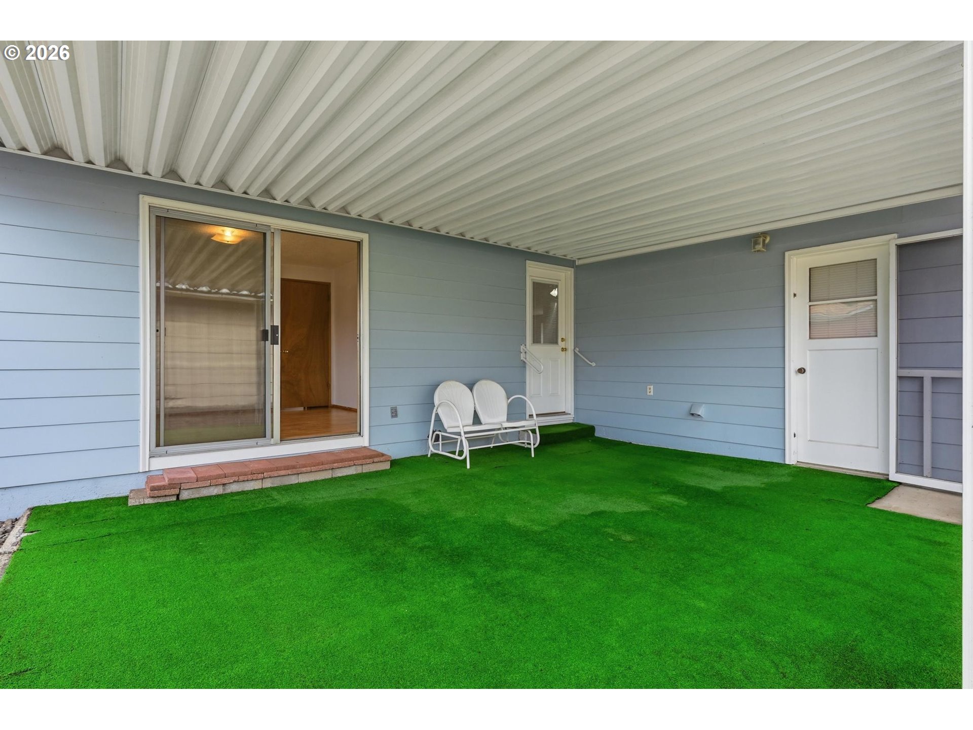 1720 Jansen Way Woodburn, OR 97071 - Photo 32 of 42 a backyard of a house with table and chairs