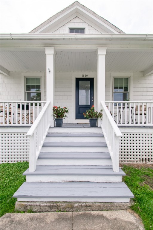 1860 East Main Road Portsmouth, RI 02871 - Photo 3 of 29 Wide front steps lead to the covered porch.