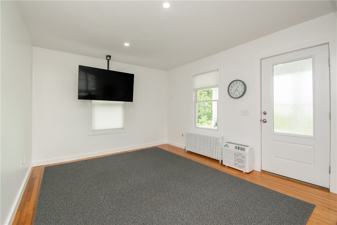 1860 East Main Road Portsmouth, RI 02871 - Photo 7 of 29 The living room measures approx. 11 x 13. All the rooms have 8ft ceiling height.