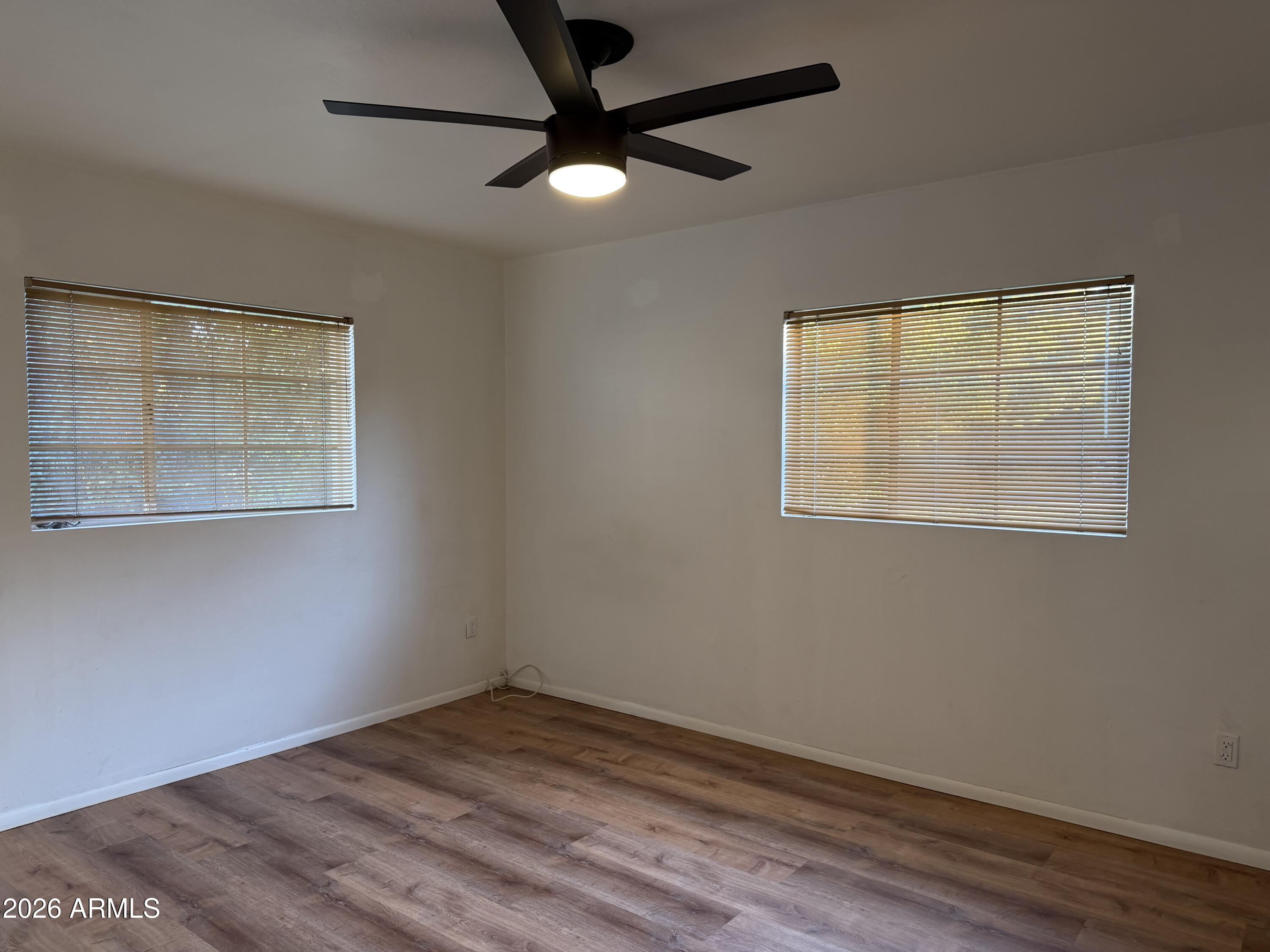 5730 North 4th Street Phoenix, AZ 85012 - Photo 14 of 15 an empty room with a window