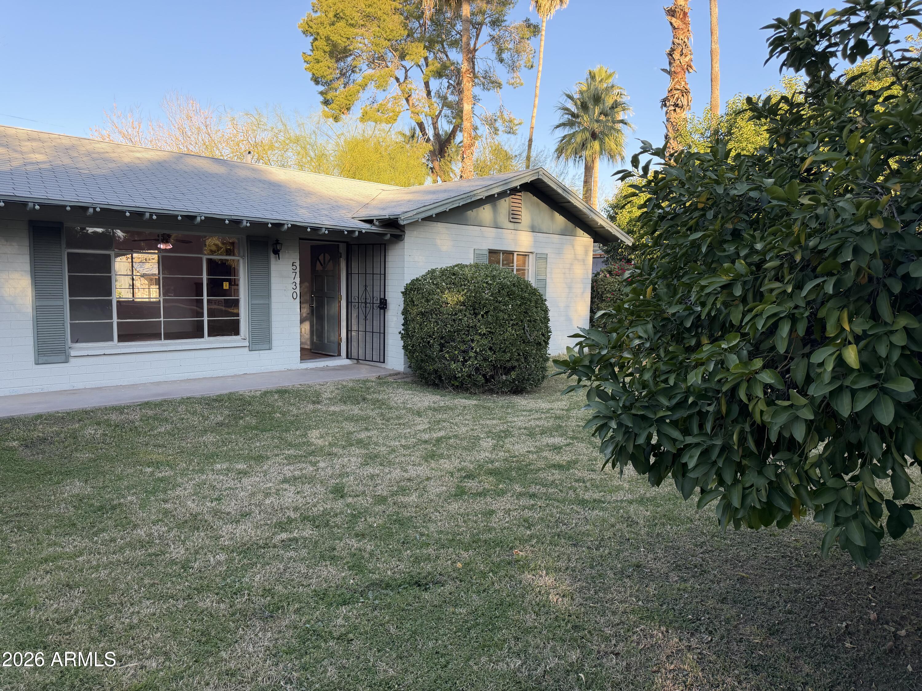 5730 North 4th Street Phoenix, AZ 85012 - Photo 2 of 15 a front view of a house with garden