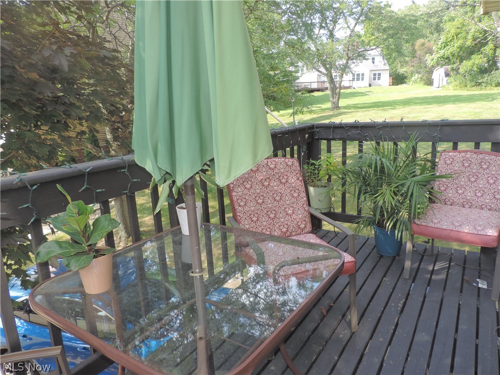139 Quaker Ridge Drive Akron, OH 44313 - Photo 15 of 16 Deck overlooks yard and woods