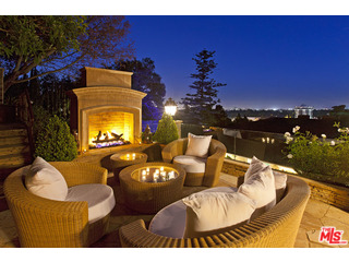 610 Estrellita Way Los Angeles, CA 90049 - Photo 1 of 53 a view of a outdoor space with seating area