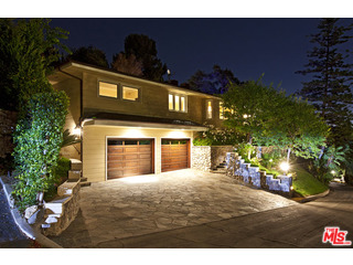 610 Estrellita Way Los Angeles, CA 90049 - Photo 2 of 53 a view of a garage