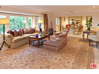 610 Estrellita Way Los Angeles, CA 90049 - Photo 13 of 53 a living room with furniture and a large window