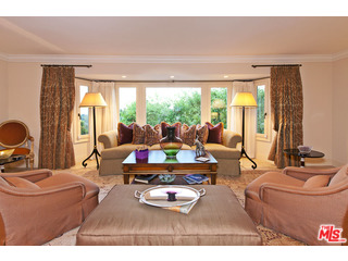 610 Estrellita Way Los Angeles, CA 90049 - Photo 14 of 53 a living room with furniture and a large window