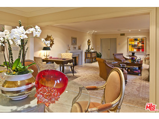 610 Estrellita Way Los Angeles, CA 90049 - Photo 15 of 53 a living room with dining room and wooden floor