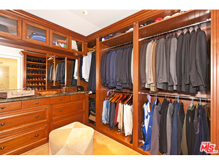 610 Estrellita Way Los Angeles, CA 90049 - Photo 27 of 53 a view of a swimming pool with an outdoor seating