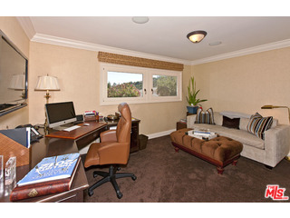 610 Estrellita Way Los Angeles, CA 90049 - Photo 31 of 53 a living room with furniture and floor to ceiling window