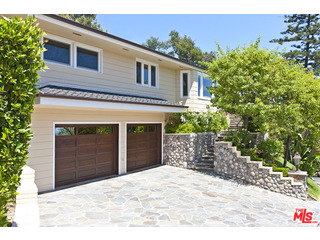 610 Estrellita Way Los Angeles, CA 90049 - Photo 35 of 53 a house view with a outdoor space