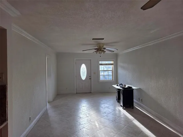 a kitchen with stainless steel appliances granite countertop a refrigerator and a microwave