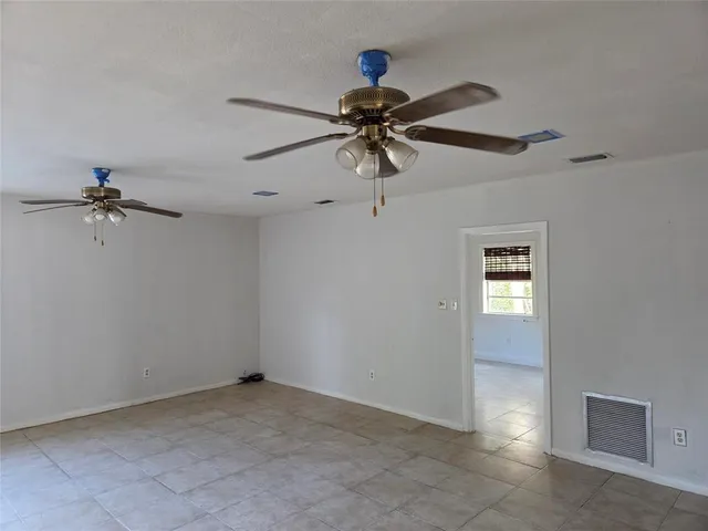 a kitchen with stainless steel appliances granite countertop a refrigerator and a microwave