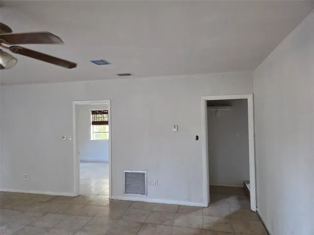 a kitchen with stainless steel appliances granite countertop a stove microwave and sink