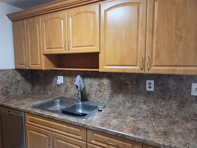 a bathroom with a bathtub and a sink