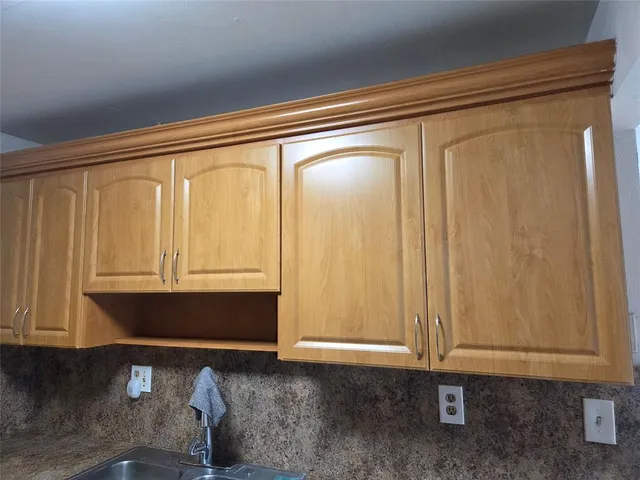 a bathroom with a sink and shower