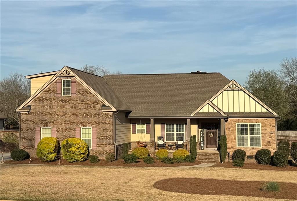 a front view of a house with a yard