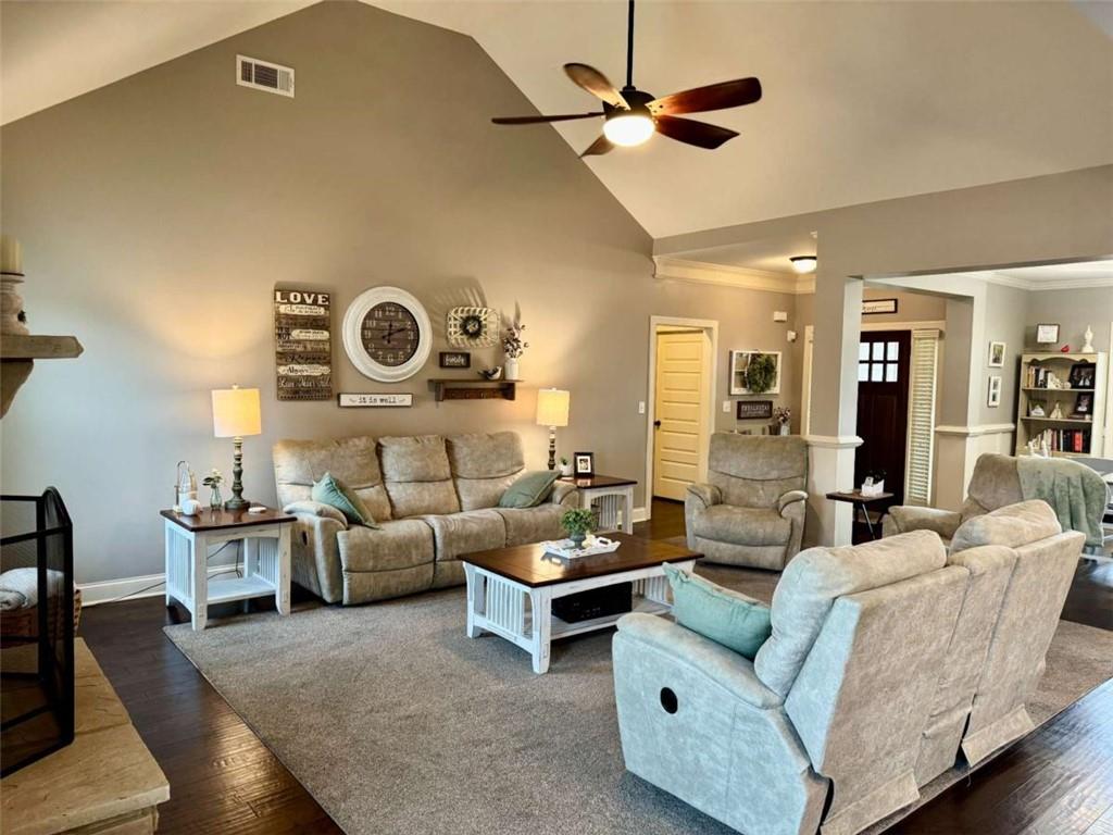 107 Feather Lane Jackson, GA 30233 - Photo 13 of 30 a living room with furniture and a clock