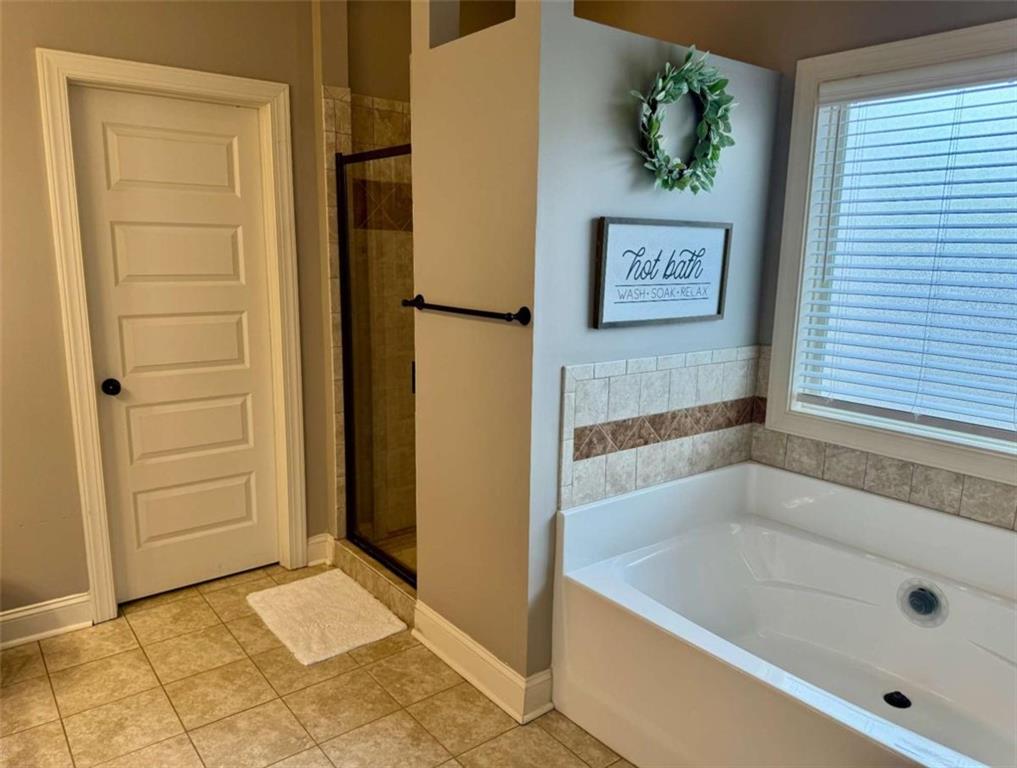 107 Feather Lane Jackson, GA 30233 - Photo 18 of 30 a bathroom with a bathtub