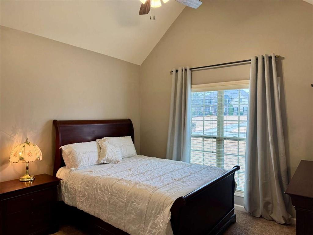 107 Feather Lane Jackson, GA 30233 - Photo 20 of 30 a bedroom with a bed and a window